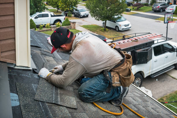 Professional Roofing technician working in Grove City, FL